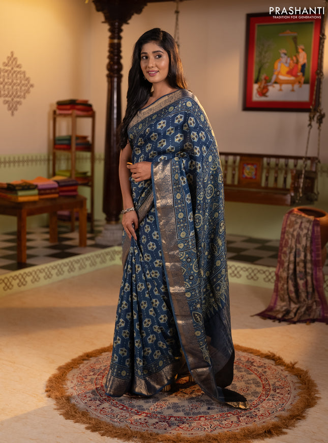 Dola silk saree indigo blue with allover ajrakh butta prints and zari woven border