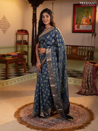 Dola silk saree indigo blue with allover ajrakh butta prints and zari woven border