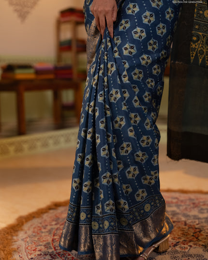 Dola silk saree indigo blue with allover ajrakh butta prints and zari woven border