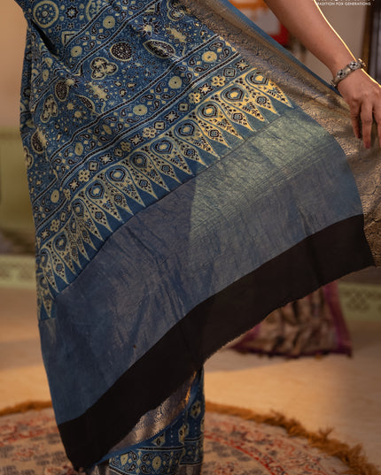 Dola silk saree indigo blue with allover ajrakh butta prints and zari woven border