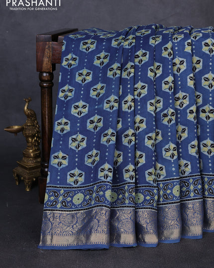 Dola silk saree indigo blue with allover ajrakh butta prints and zari woven border