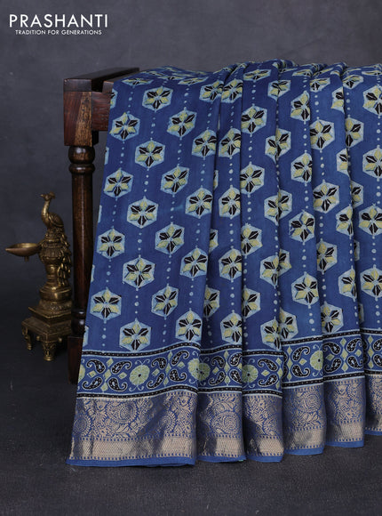 Dola silk saree indigo blue with allover ajrakh butta prints and zari woven border
