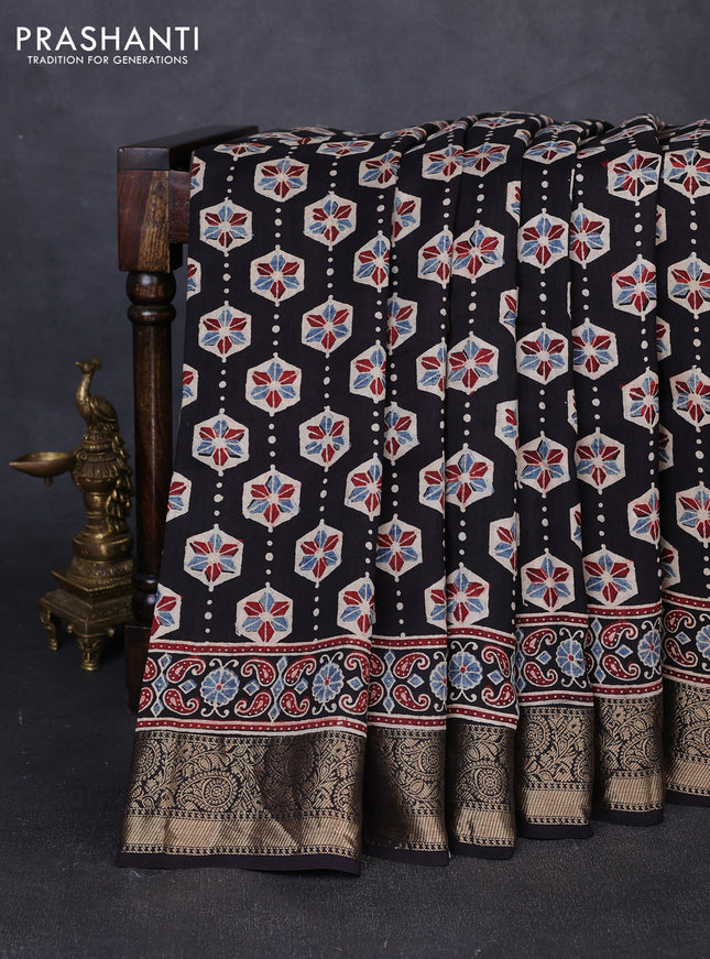 Dola silk saree black and maroon with allover ajrakh butta prints and zari woven border