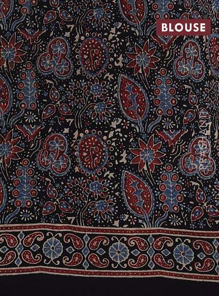 Dola silk saree black and maroon with allover ajrakh butta prints and zari woven border