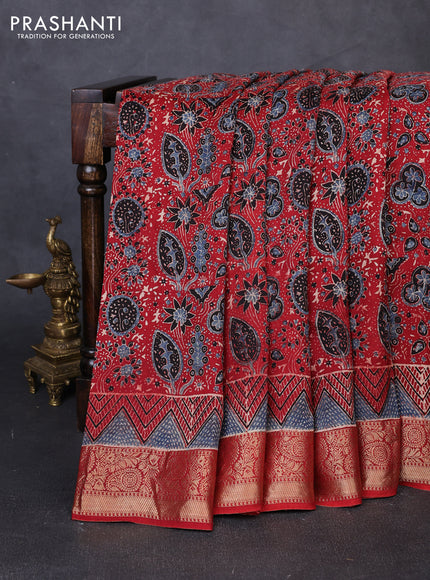 Dola silk saree maroon with allover ajrakh prints and zari woven border