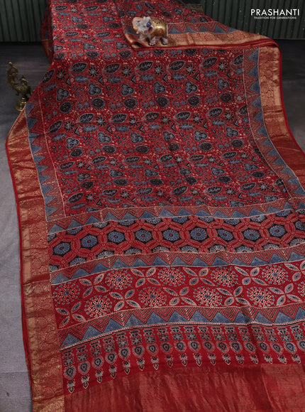 Dola silk saree maroon with allover ajrakh prints and zari woven border