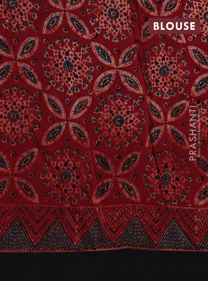 Dola silk saree maroon with allover ajrakh prints and zari woven border