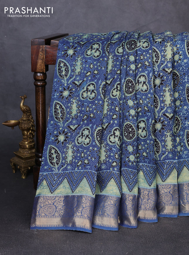 Dola silk saree indigo blue with allover ajrakh prints and zari woven border