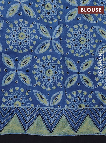 Dola silk saree indigo blue with allover ajrakh prints and zari woven border
