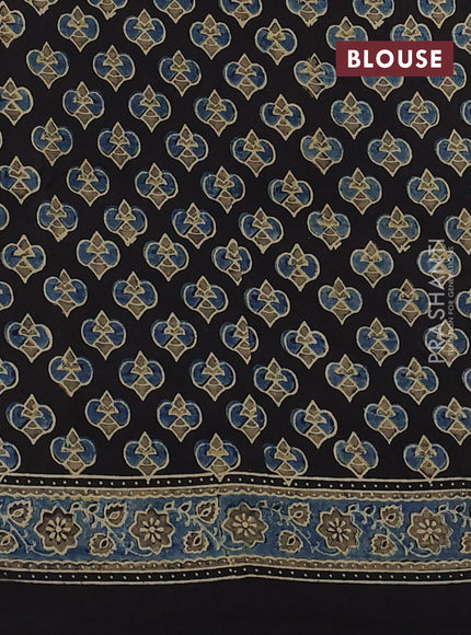 Dola silk saree blue shade and black with allover ajrakh prints and zari woven border
