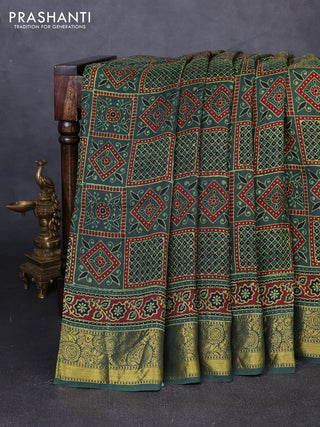 Dola silk saree green shade and maroon with allover ajrakh prints and zari woven border