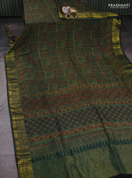 Dola silk saree green shade and maroon with allover ajrakh prints and zari woven border