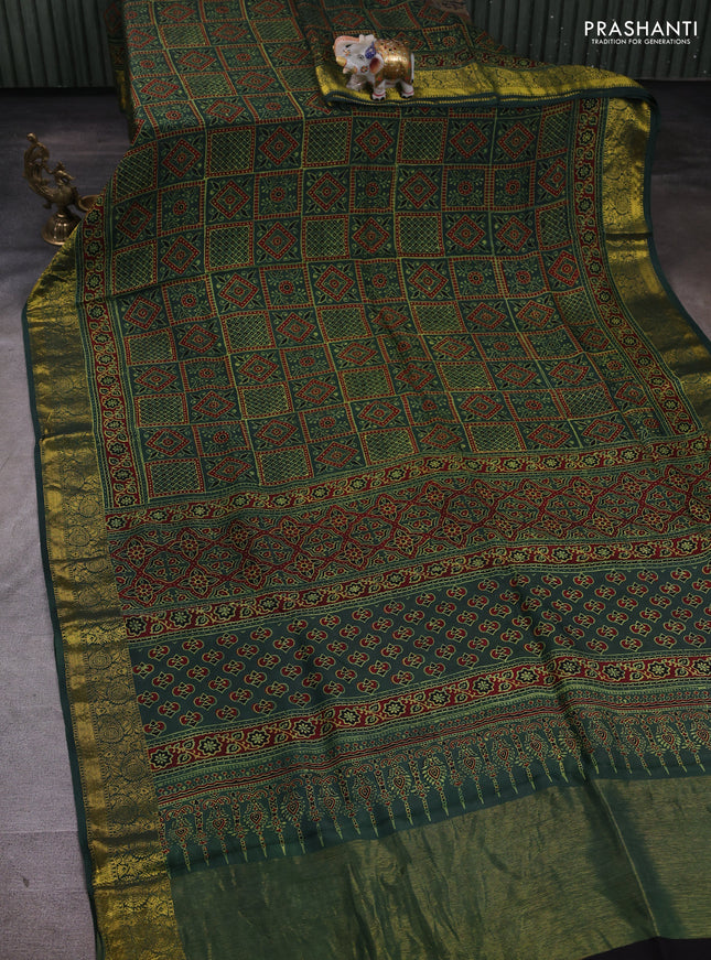 Dola silk saree green shade and maroon with allover ajrakh prints and zari woven border