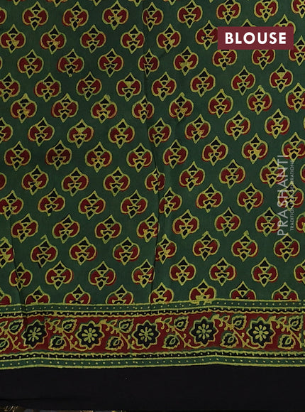 Dola silk saree green shade and maroon with allover ajrakh prints and zari woven border