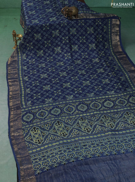 Dola silk saree blue with allover butta prints and zari woven border
