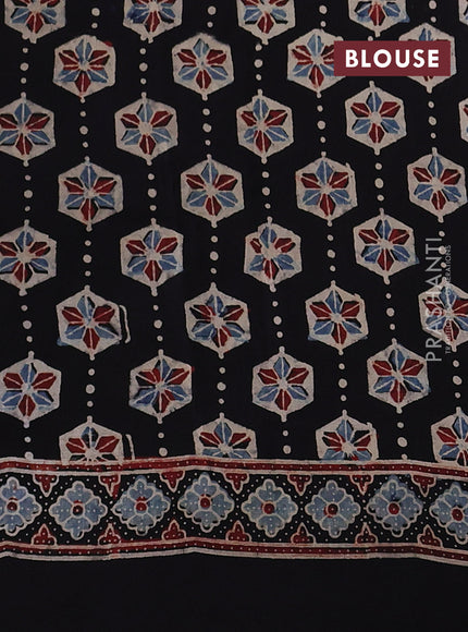 Dola silk saree black and maroon with allover ajrakh prints and zari woven border