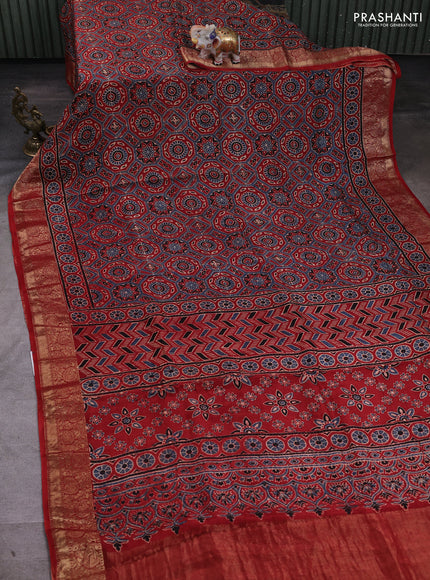 Dola silk saree maroon with allover ajrakh prints and zari woven border