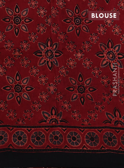 Dola silk saree maroon with allover ajrakh prints and zari woven border