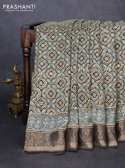 Dola silk saree indigo blue and black with allover ajrakh prints and zari woven border