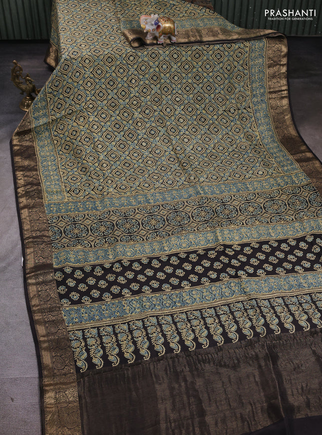 Dola silk saree indigo blue and black with allover ajrakh prints and zari woven border