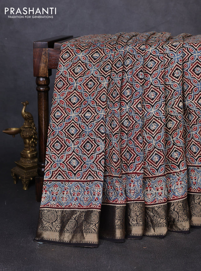 Dola silk saree blue shade and maroon with allover ajrakh prints and zari woven border