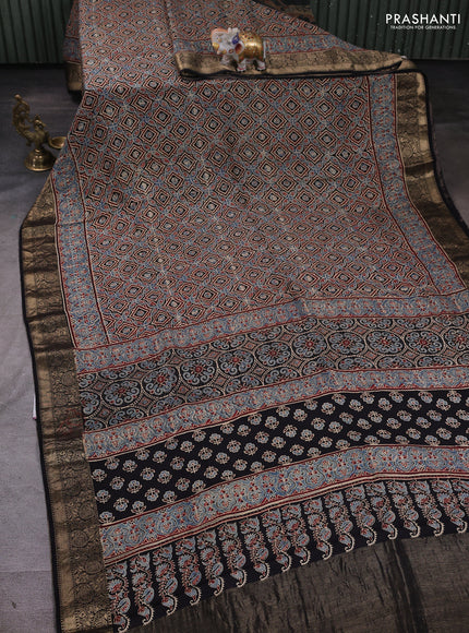 Dola silk saree blue shade and maroon with allover ajrakh prints and zari woven border