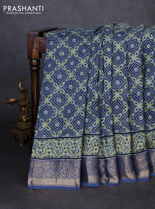 Dola silk saree indigo blue and yellow with allover ajrakh prints and zari woven border