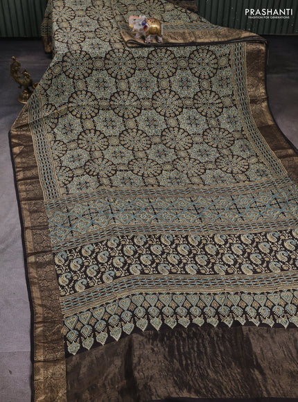 Dola silk saree coffee brown with allover ajrakh prints and zari woven border