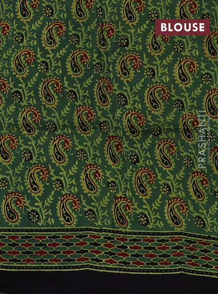 Dola silk saree green shade with allover ajrakh prints and zari woven border