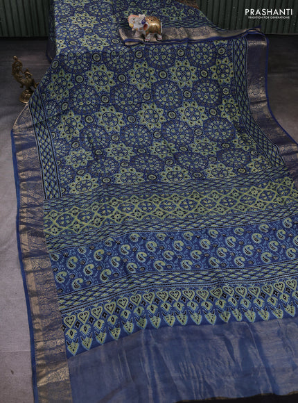 Dola silk saree indigo blue with allover ajrakh prints and zari woven border