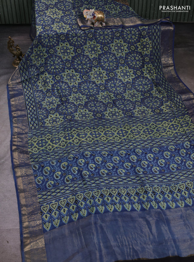 Dola silk saree indigo blue with allover ajrakh prints and zari woven border