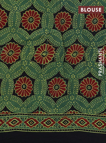 Dola silk saree green shade with allover butta prints and zari woven border