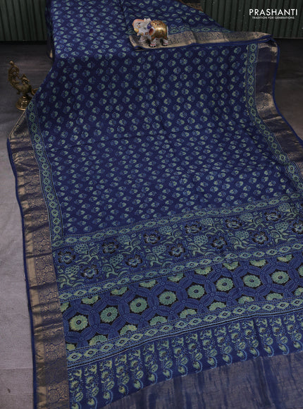 Dola silk saree indigo blue with allover butta prints and zari woven border