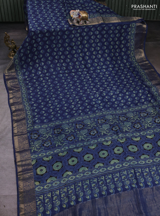 Dola silk saree indigo blue with allover butta prints and zari woven border
