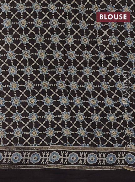 Dola silk saree blue shade with allover ajrakh prints and zari woven border
