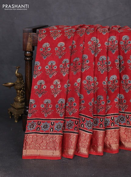 Dola silk saree maroon with allover ajrakh prints and zari woven border