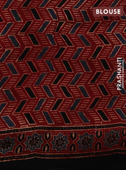 Dola silk saree maroon with allover ajrakh prints and zari woven border