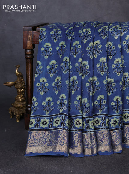 Dola silk saree indigo blue and blue shade with allover ajrakh prints and zari woven border