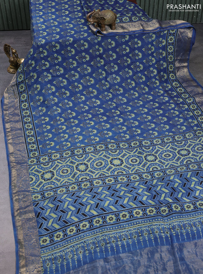 Dola silk saree indigo blue and blue shade with allover ajrakh prints and zari woven border