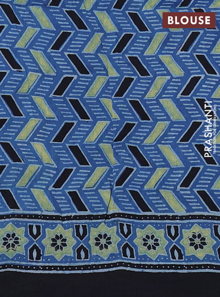 Dola silk saree indigo blue and blue shade with allover ajrakh prints and zari woven border