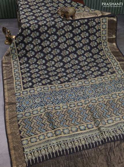 Dola silk saree indigo blue and black with allover ajrakh prints and zari woven border