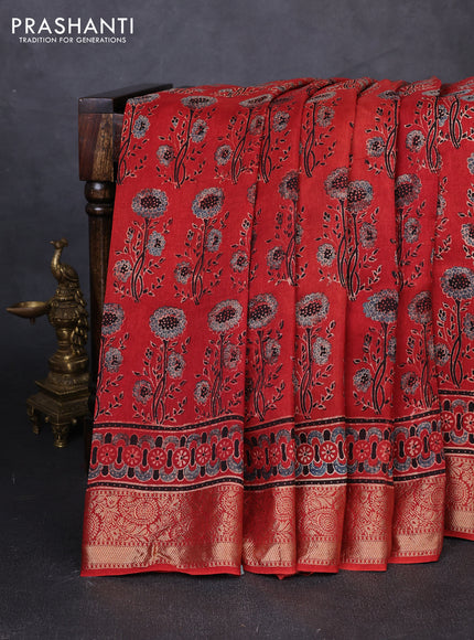 Dola silk saree maroon with allover ajrakh prints and zari woven border