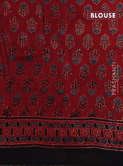 Dola silk saree maroon with allover ajrakh prints and zari woven border