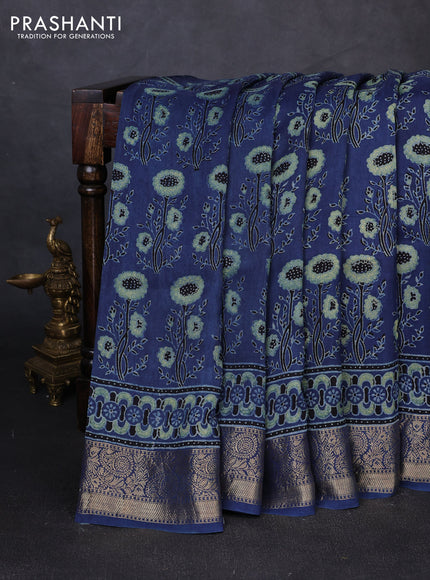 Dola silk saree indigo blue with allover ajrakh prints and zari woven border
