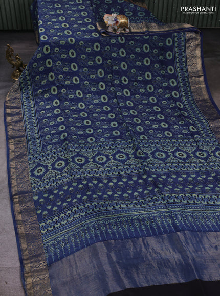Dola silk saree indigo blue with allover ajrakh prints and zari woven border