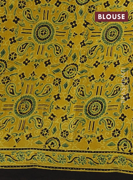 Dola silk saree yellow with allover floral butta prints and zari woven border
