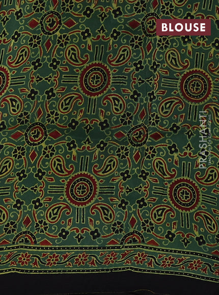 Dola silk saree green with allover floral butta prints and zari woven border