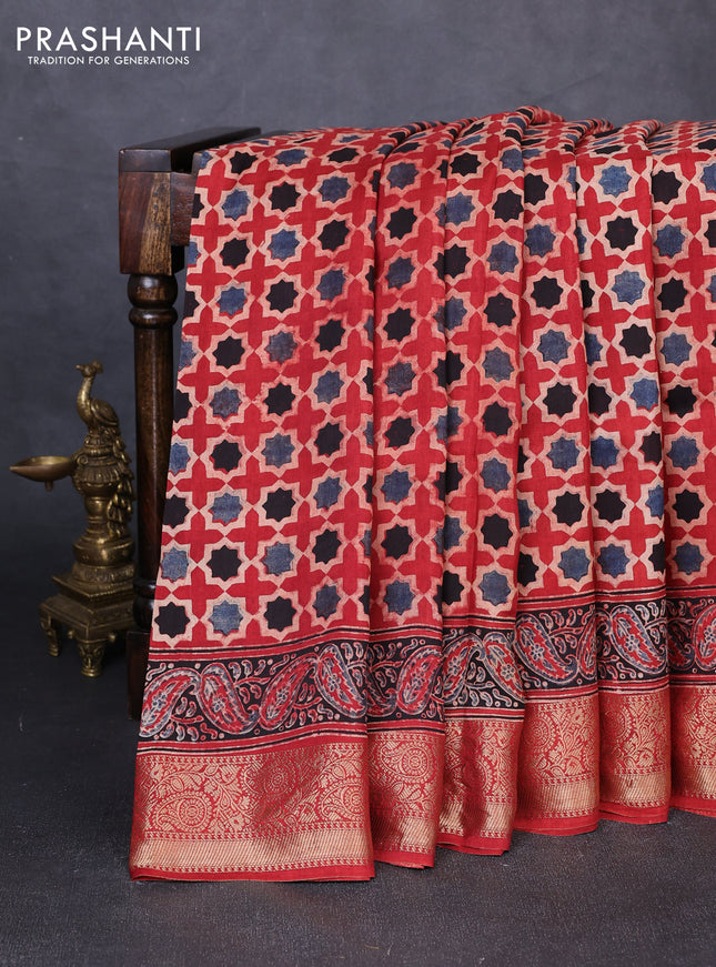 Dola silk saree maroon with allover floral butta prints and zari woven border