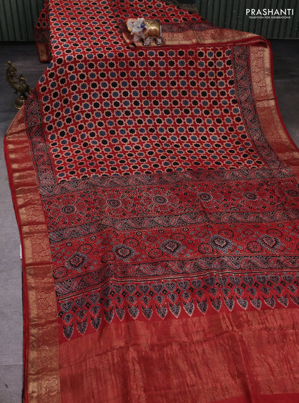 Dola silk saree maroon with allover floral butta prints and zari woven border