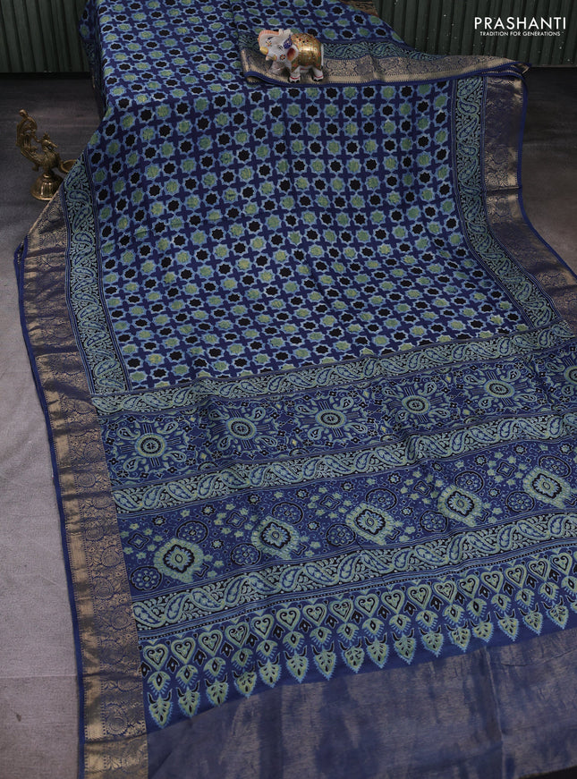 Dola silk saree indigo blue with allover floral butta prints and zari woven border